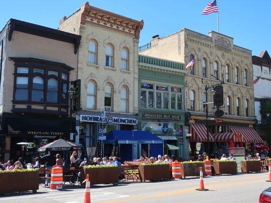 Vibrant patio scene on quaint Old World 3rd Street.