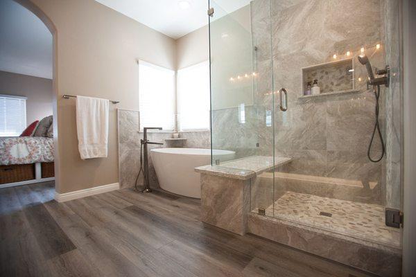 Master bath with freestanding tub, customer shower and Brizo plumbing fixtures