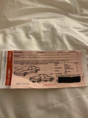 Slip showing no damages to car without the employee's name