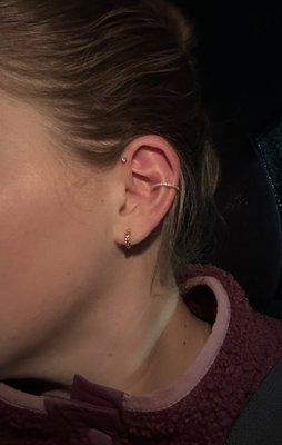 FORWARD HELIX piercing was done by Michael. (Not the conch or lobe!)