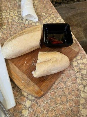 Complimentary bread served with a chili oil