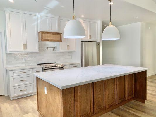 Quartz Countertops with White Cloe Backsplash.