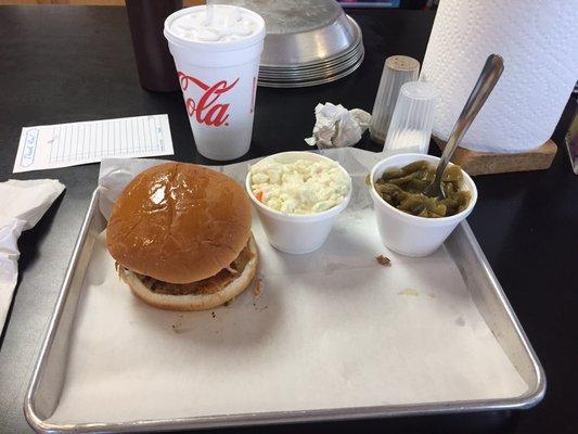 Smoked chicken sandwich, slaw, and green beans.