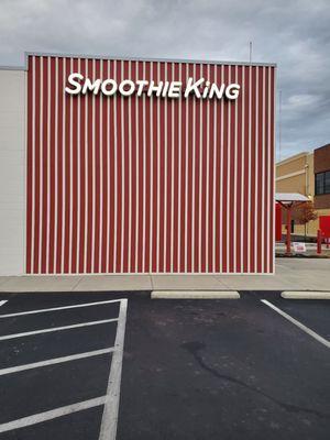 The wall as you enter the drive-thru