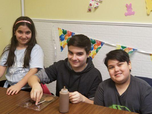 Students at March 2018 kid's Easter candy making class.