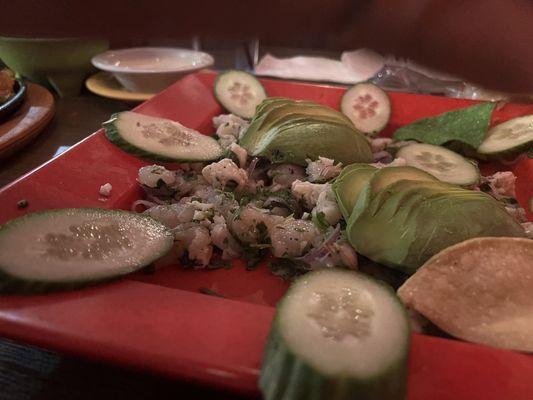 Ceviche not marinated long enough to be considered "cooked".