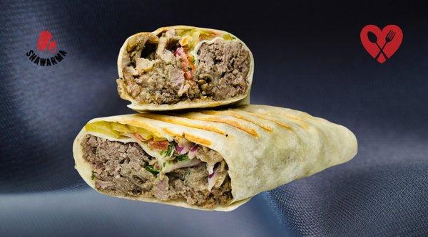 Beef Shawarma Wrap.
Hand sliced premium Halal beef, marinated with our special shawarma spices. fresh lettuce, tomato, onion, pickles.....