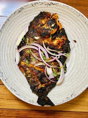 Whole tandoori fish. Fish is sweet.