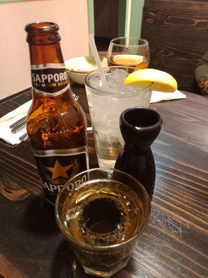 Sake Bomb is shot glass of sake submerged in beer of choice.