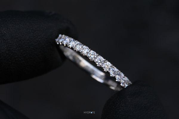 French Pavé Diamond Eternity Band Handcrafted In White Gold. Custom Made To Order