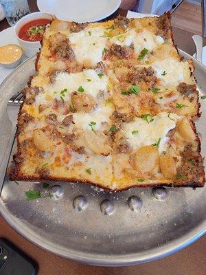 The square sausage pizza