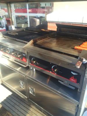 A flat top grill and a char broiler are the tools used to make you the best sausages possible!