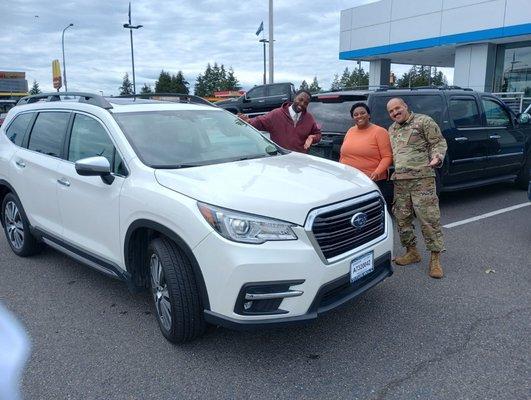 Me and my wife standing next our new 22 Subaru with the help of Tyrell Bennett delivering 5 star service and getting the job done!