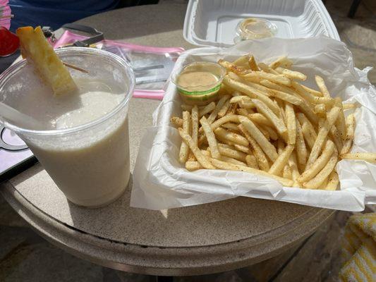 Seasoned Fries and a yummy Pina Colada