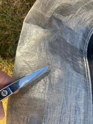 Damaged product from Rainy Pass leaving their scissors in my tent!