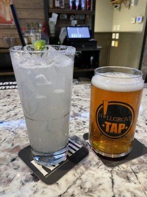 House Margarita on the rocks and a cider beer