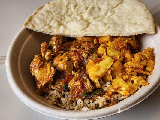 Garlic Chicken, black pepper cumin rice, aloo galbi (cauliflower & potatoes), & naan. One of their best dishes I've had!