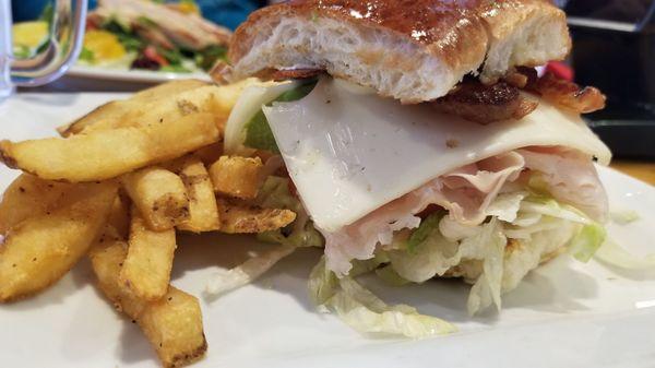 Half turkey club with fries and caesar salad (not shown) - an $8 lunch special