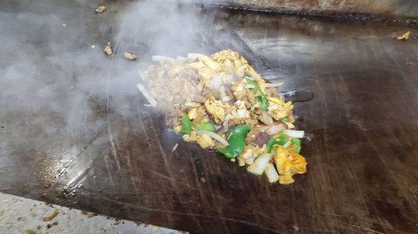 Chicken and lamb for mix over rice being cooked in the grill