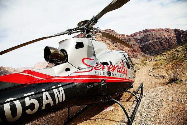 On the ground in the canyon.