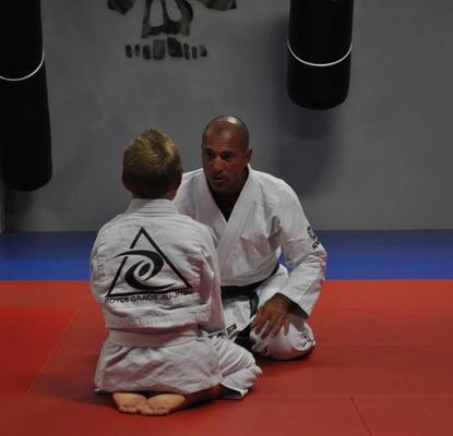 Royce Gracie sparring with one of our kids.