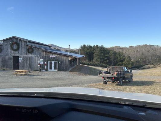 On the weekends, this barn has wreaths for sale and a hot fire