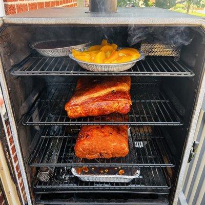 Bone in pork shoulders, duroc hogs w smoked apples, peaches and bbq beans