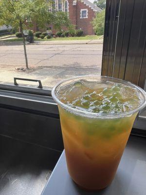 Signature Fruit Tea - Tropical Bliss -
sencha green tea blend with peach, mango, & passion fruit purees, simple syrup, & kiwi popping boba