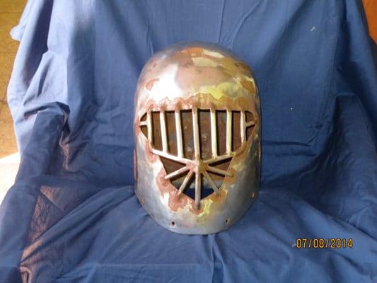 Before on a medieval type helmet.