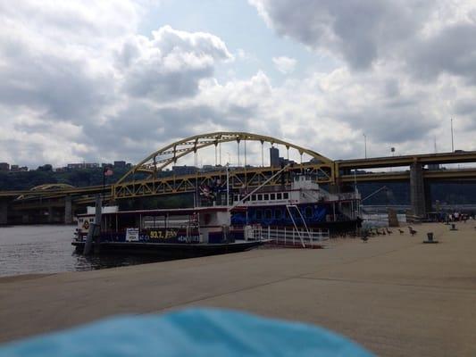 Gateway Clipper boats and guy feeding geese.