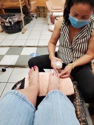 Pedicure. She did my nails already.