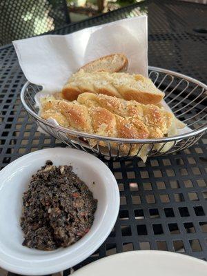 Before you order an appetizer, just wait, they're going to bring a really good bread and this amazing tapenade.