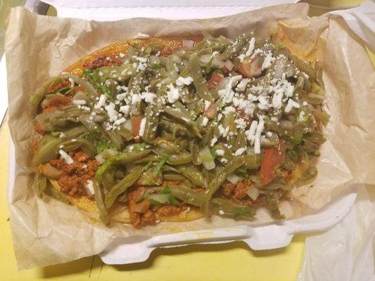 Huarache with chorizo and nopales.