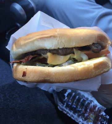 Oh my, oh my! Old fashioned bacon cheeseburger with Mayo and mustard, chopped onions, melted American cheese, sliced tomatoes, lettuce.