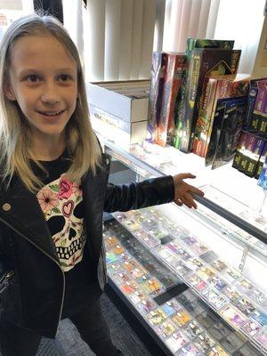 She was enamored by the Pokémon card selection!