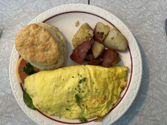 Greek Omelet, potatoes, and the real star- the biscuit!