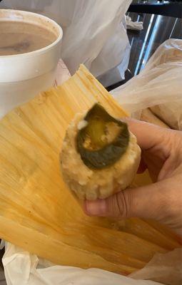 Champurrado and tamal de queso con rajas