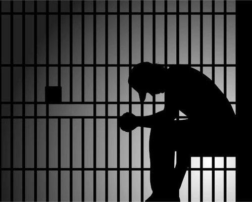 Aurora Bail Bonds - Defendant sitting in a Aurora Colorado  Jail