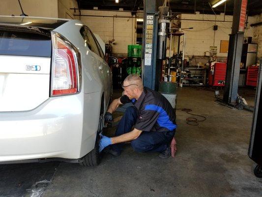 Kenny working on a Prius. We work on Hybrids!