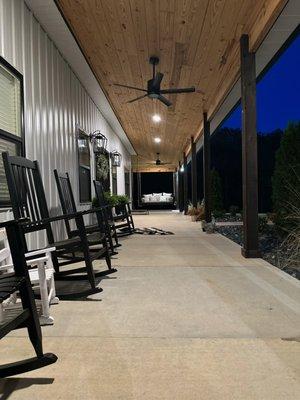 The Maple Barndominium  Rocking Chairs on Front porch country feel