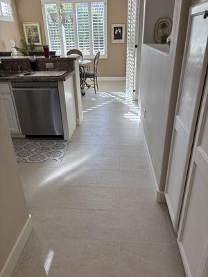 12 x 24 tile with 4" white baseboards