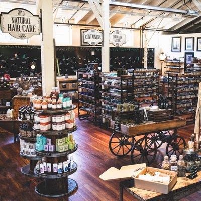 Vintage apothecary style store filled with natural wellness and body care products.