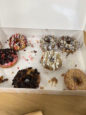 Sorry half are gone, we were too hungry. Top right are like Mounds candy with chocolate dip, coconut topping, and caramel drizzle...