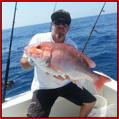 A Big Snapper caught offshore deep sea fishing with Captain John.