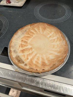 Thanksgiving pumpkin pie w/whipped cream already on it. whipped cream melted liquid into pie; flavor is great crust wet and falls apart.