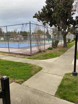 Outside gym equipment (broken) Basketball court (no hoops or nets) Soccer court (no nets) BBQ/ Grill (no propane. Got to bring your own)