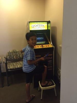 They have an arcade for the kids to play while waiting.