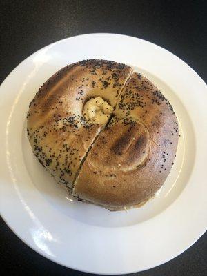 Poppy seed bagel with pumpkin cream cheese