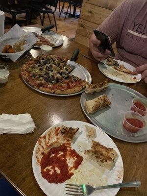 Cheesy Breadsticks, Supreme Pizza, and Wings!