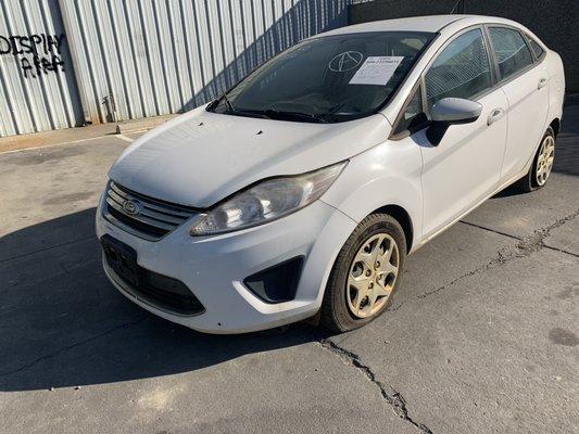 2011 Ford Fiesta for parts 1.6l at fwd white exterior black cloth interior